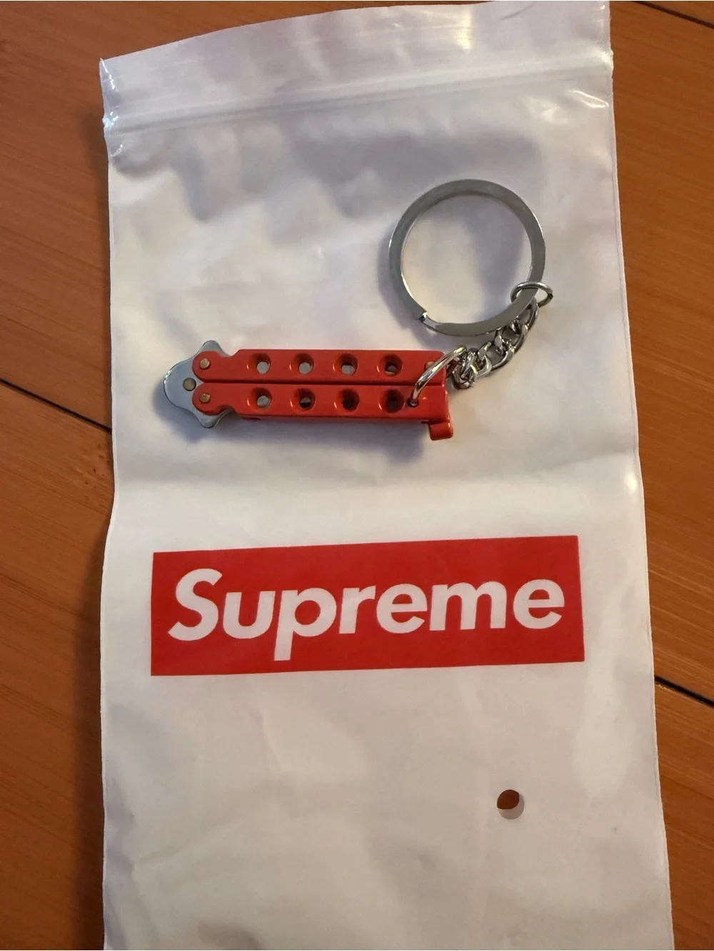 Supreme Red Mini Butterfly Keychain with White Logo